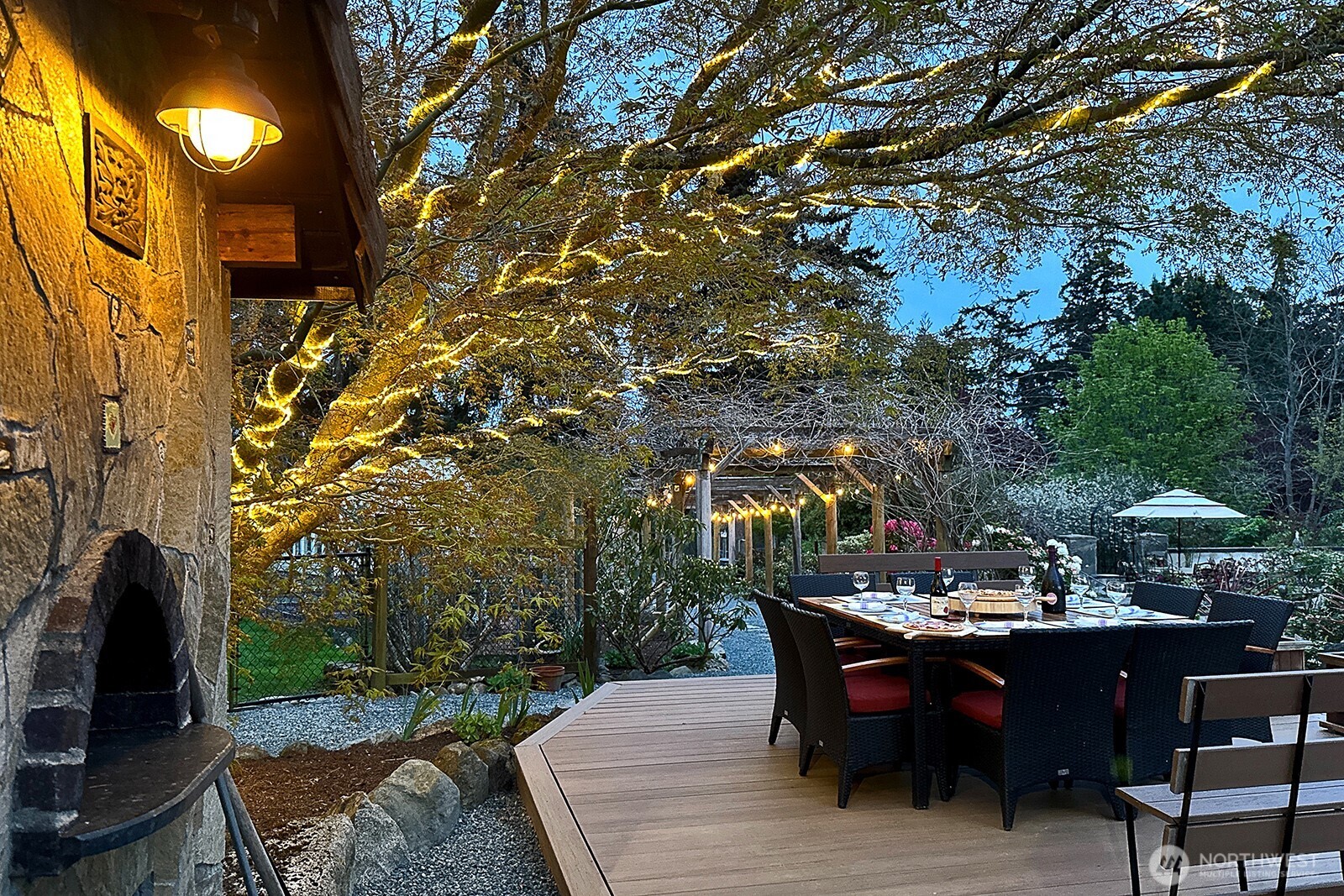 5741 Crow Haven Road Langley, WA 98260 - Photo 8 of 40 a view of a chairs and table in the patio