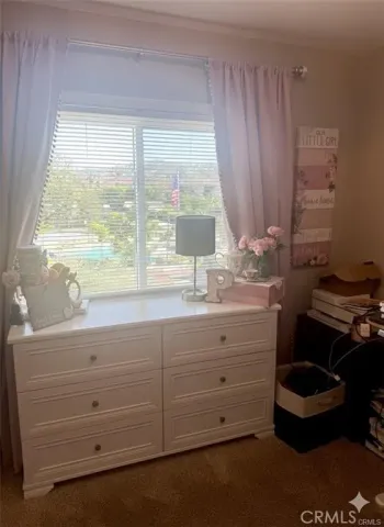 a bathroom with a sink and a window