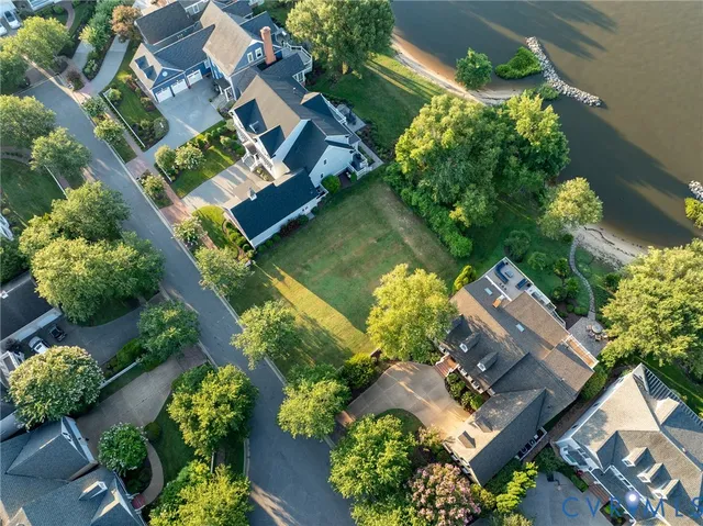 a view of a sign board in front of flowers