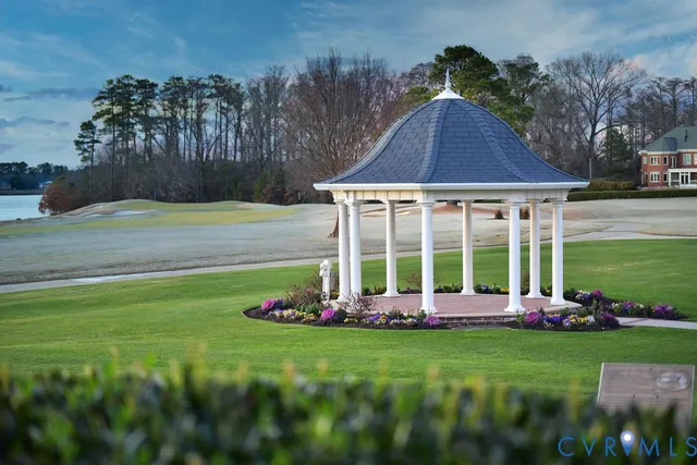 a view of a golf course with a lake