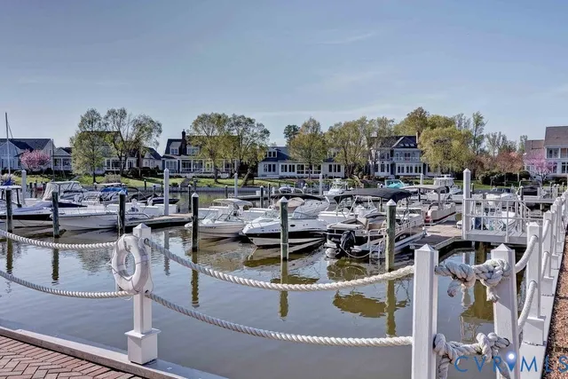 an aerial view of a house with a garden and trees