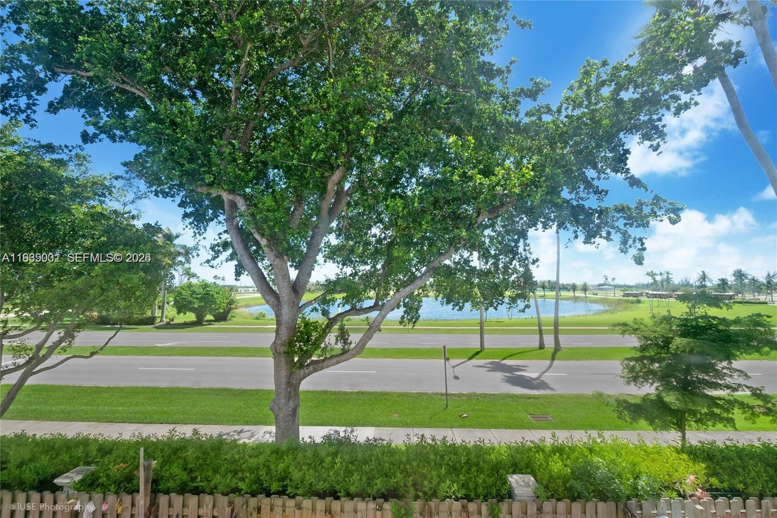 1705 Southeast 27th Street Homestead, FL 33035 - Photo 13 of 17 a view of a park that has large trees and plants