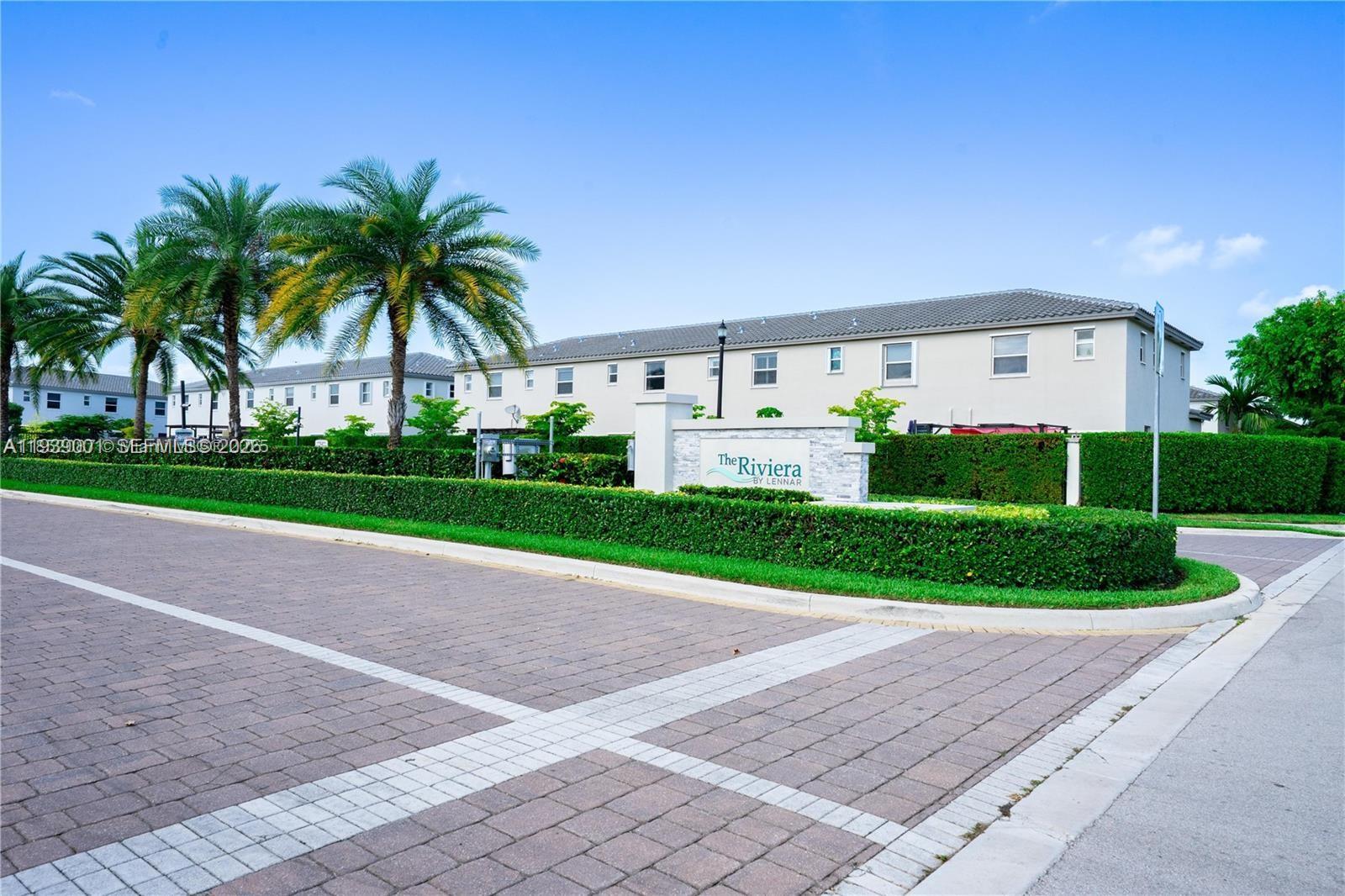 1705 Southeast 27th Street Homestead, FL 33035 - Photo 14 of 17 a front view of house with yard and green space
