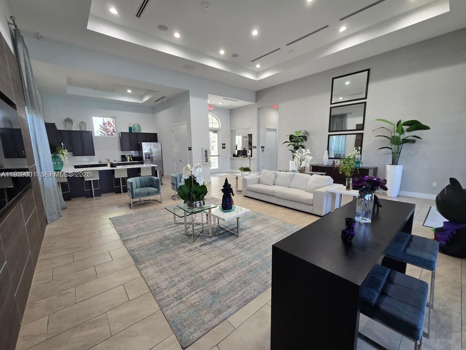 1705 Southeast 27th Street Homestead, FL 33035 - Photo 16 of 17 a living room with furniture flat screen tv and window
