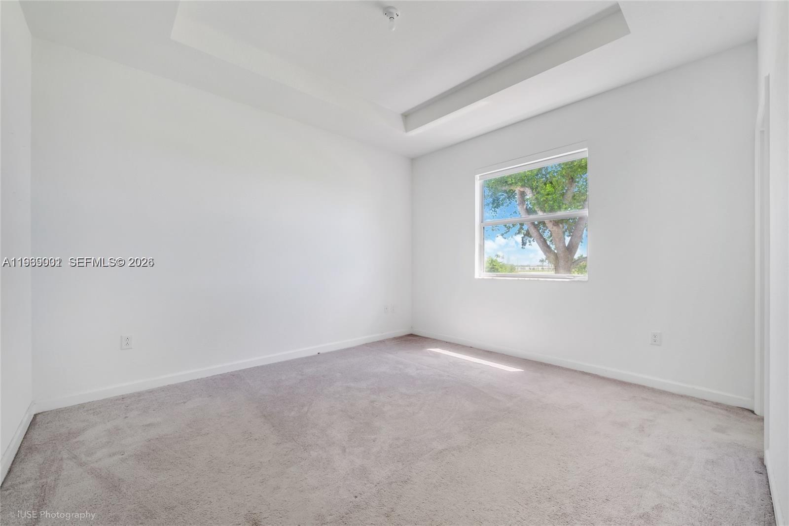 1705 Southeast 27th Street Homestead, FL 33035 - Photo 8 of 17 an empty room with windows