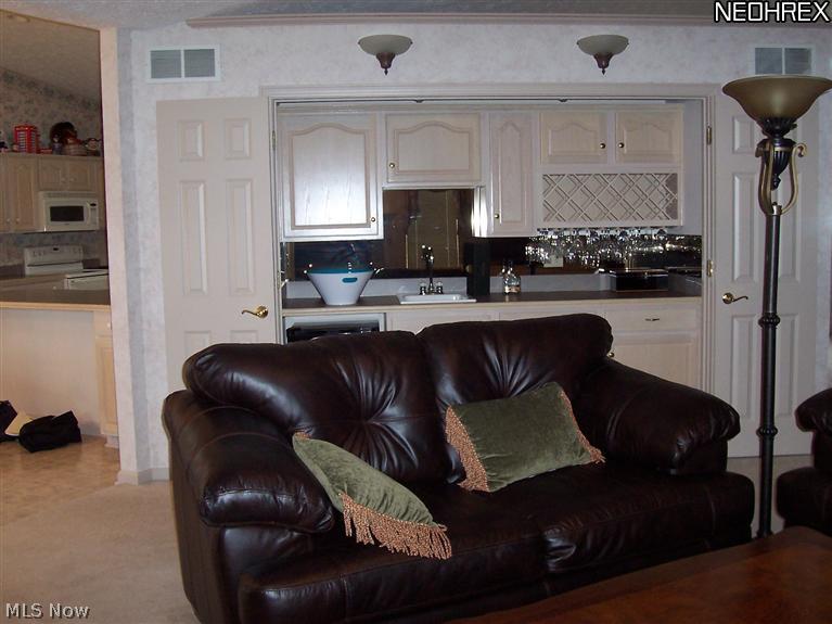 4330 Mayfair Road Uniontown, OH 44685 - Photo 9 of 19 wet bar in great room