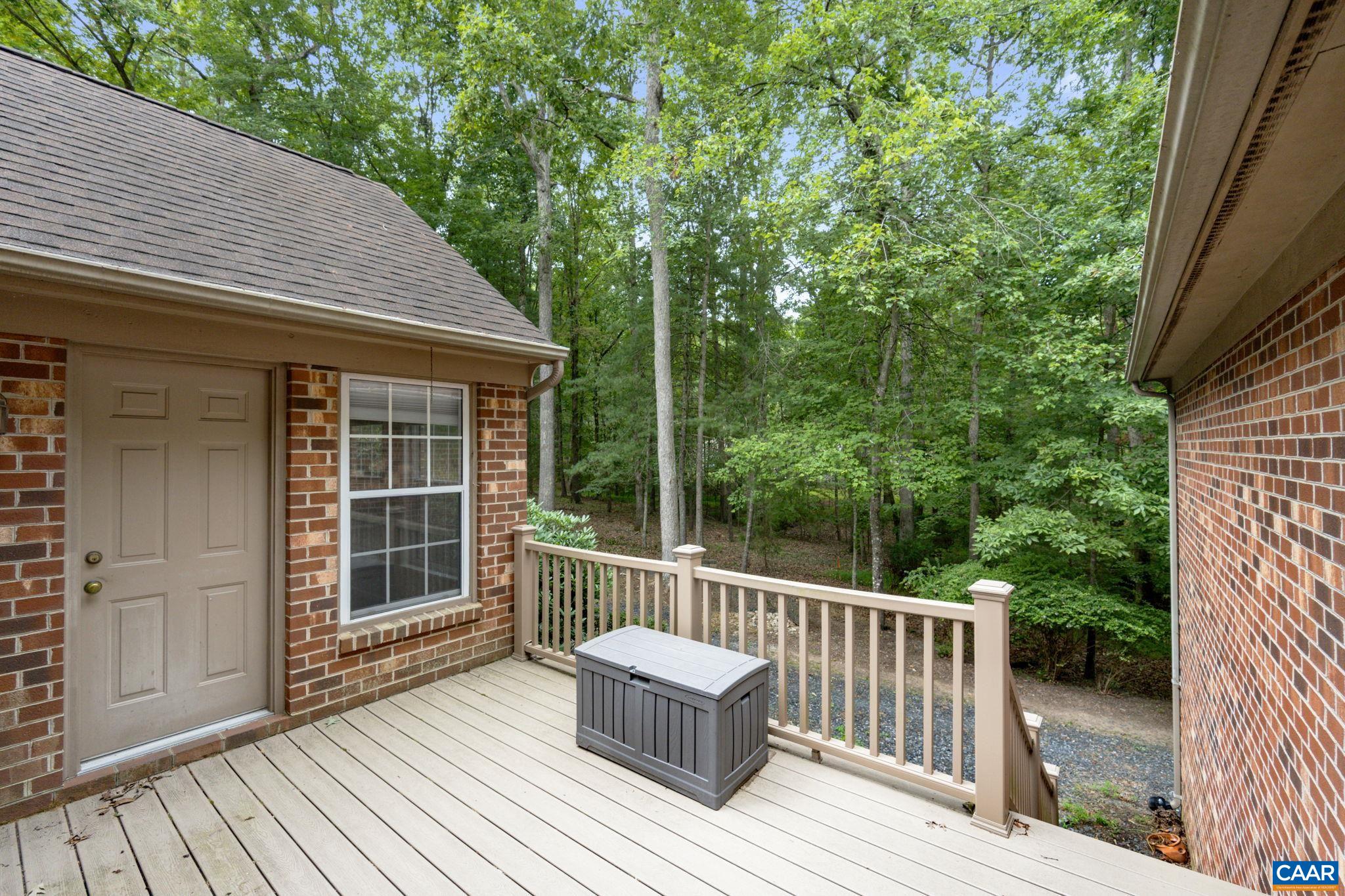 41 Colonial Road Palmyra, VA 22963 - Photo 13 of 53 a view of a wooden deck and a backyard