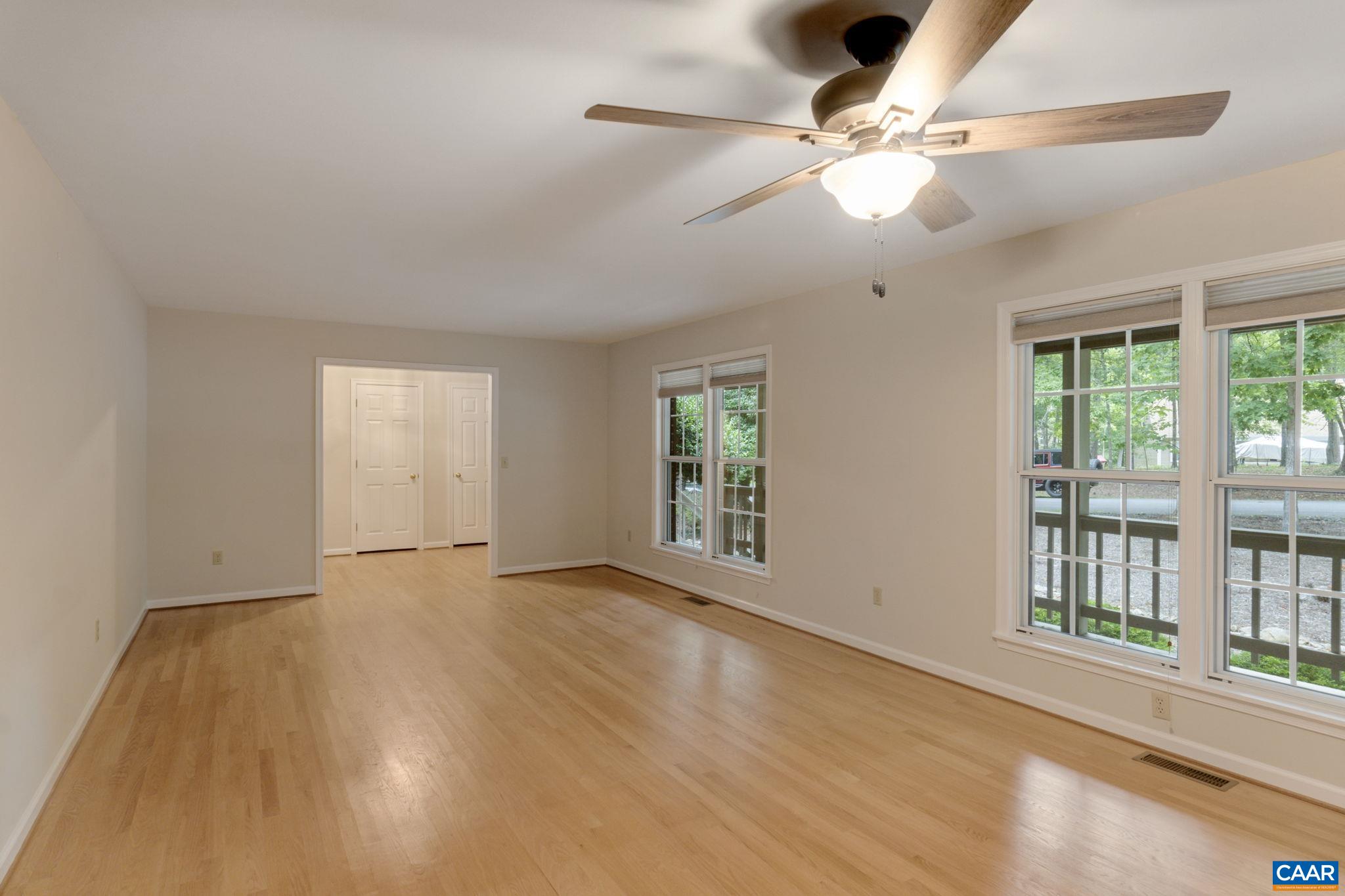 41 Colonial Road Palmyra, VA 22963 - Photo 15 of 53 a view of an empty room with a window and wooden floor