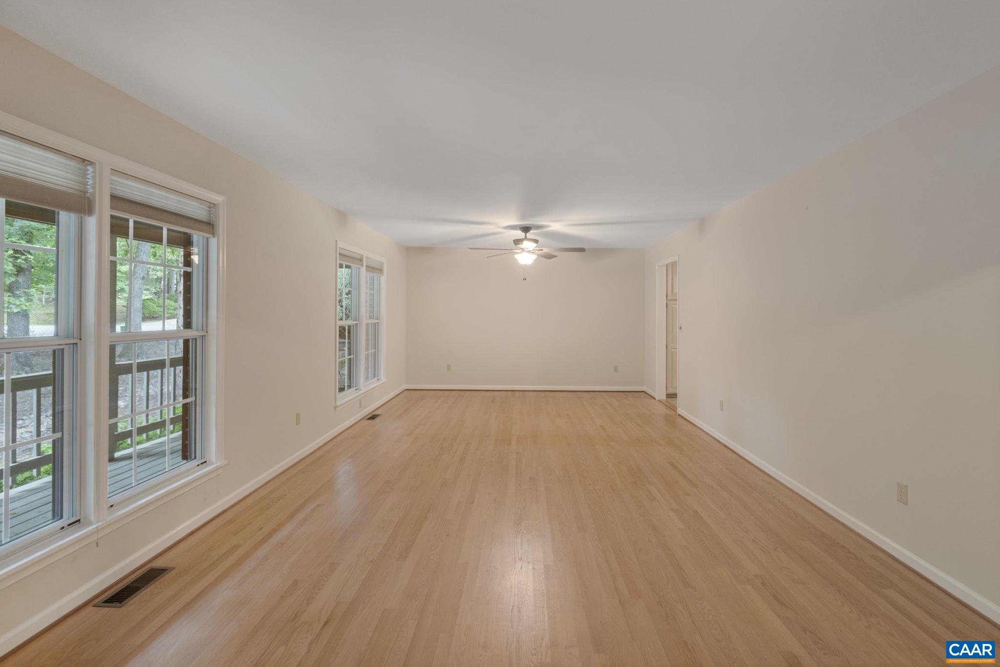 41 Colonial Road Palmyra, VA 22963 - Photo 18 of 53 a view of empty room with wooden floor and fan