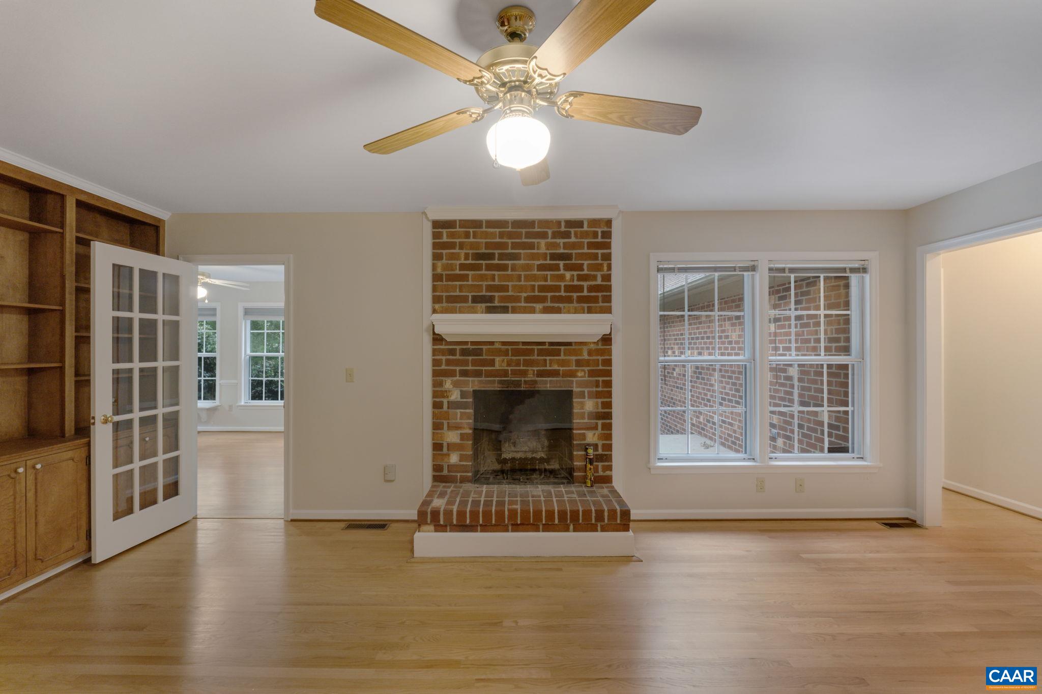 41 Colonial Road Palmyra, VA 22963 - Photo 19 of 53 a view of an empty room with glass door and wooden floor