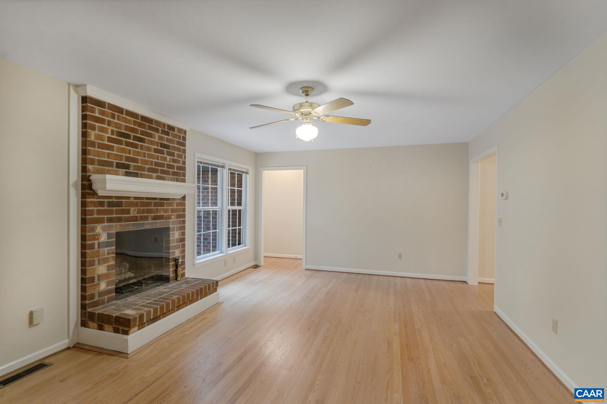 41 Colonial Road Palmyra, VA 22963 - Photo 24 of 53 wooden floor fireplace and natural light in room