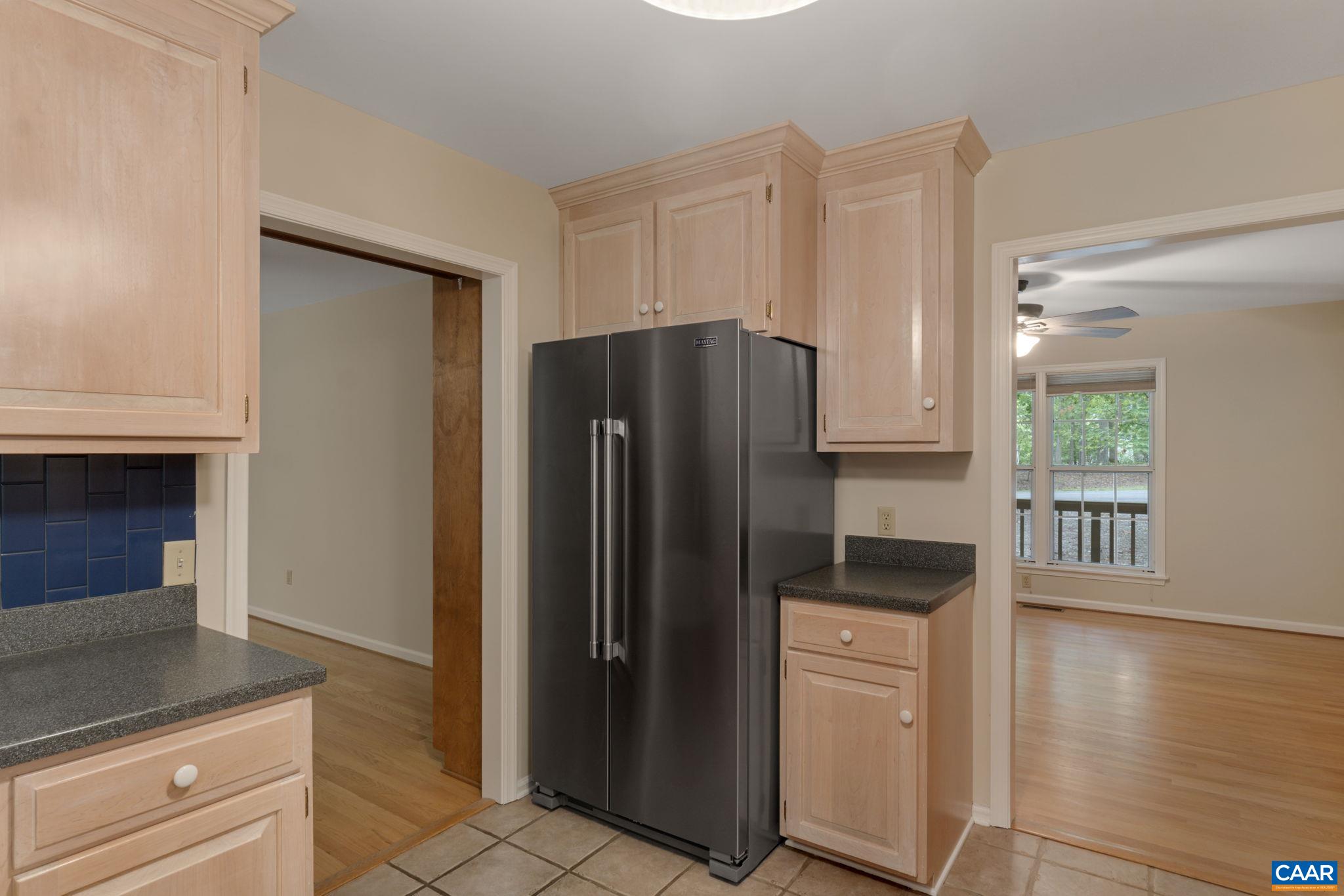 41 Colonial Road Palmyra, VA 22963 - Photo 26 of 53 a kitchen with stainless steel appliances granite countertop a refrigerator and a stove