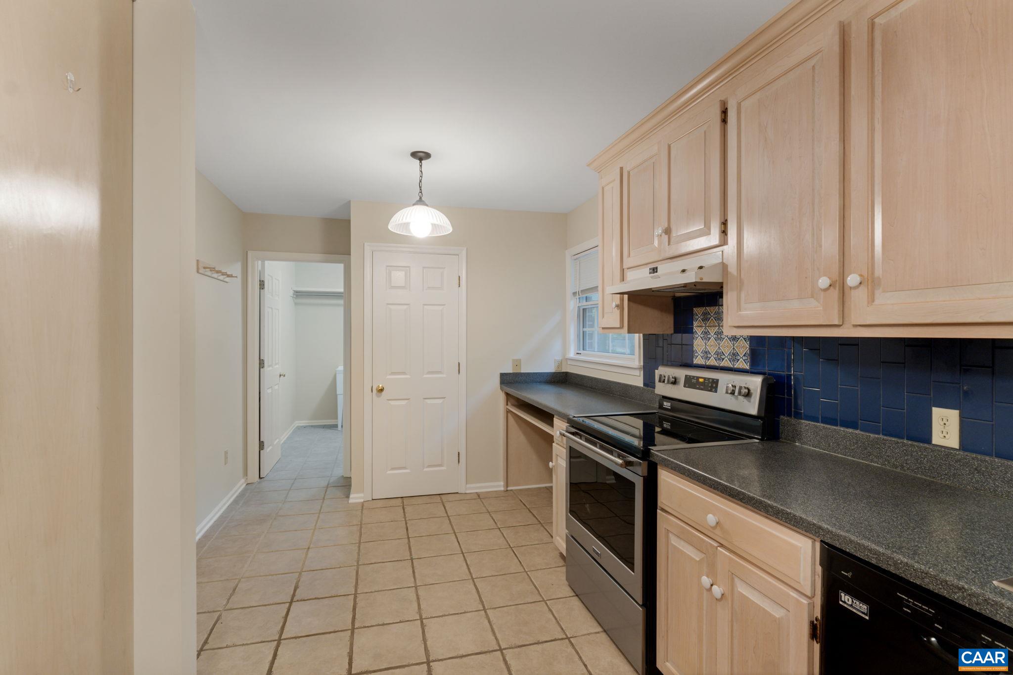 41 Colonial Road Palmyra, VA 22963 - Photo 29 of 53 a kitchen with cabinets and appliances