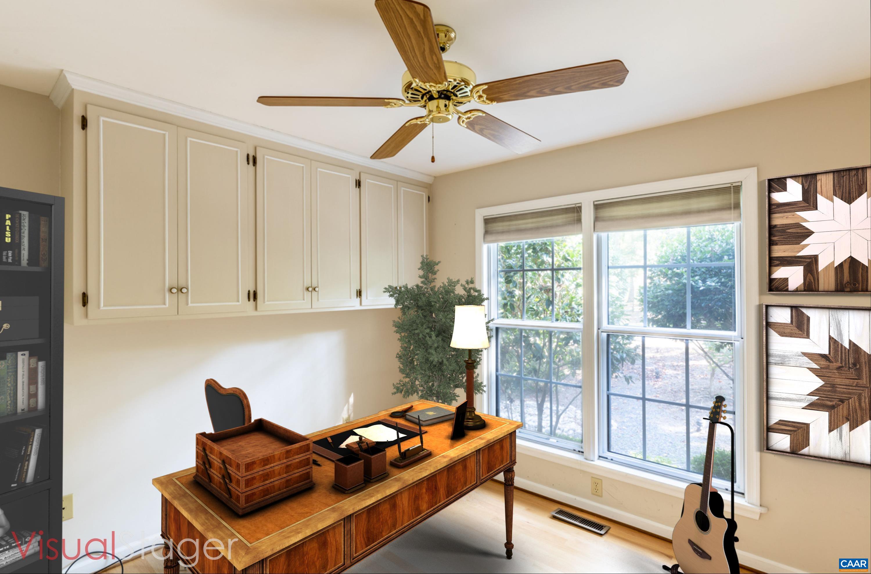 41 Colonial Road Palmyra, VA 22963 - Photo 43 of 53 a living room with furniture and a window