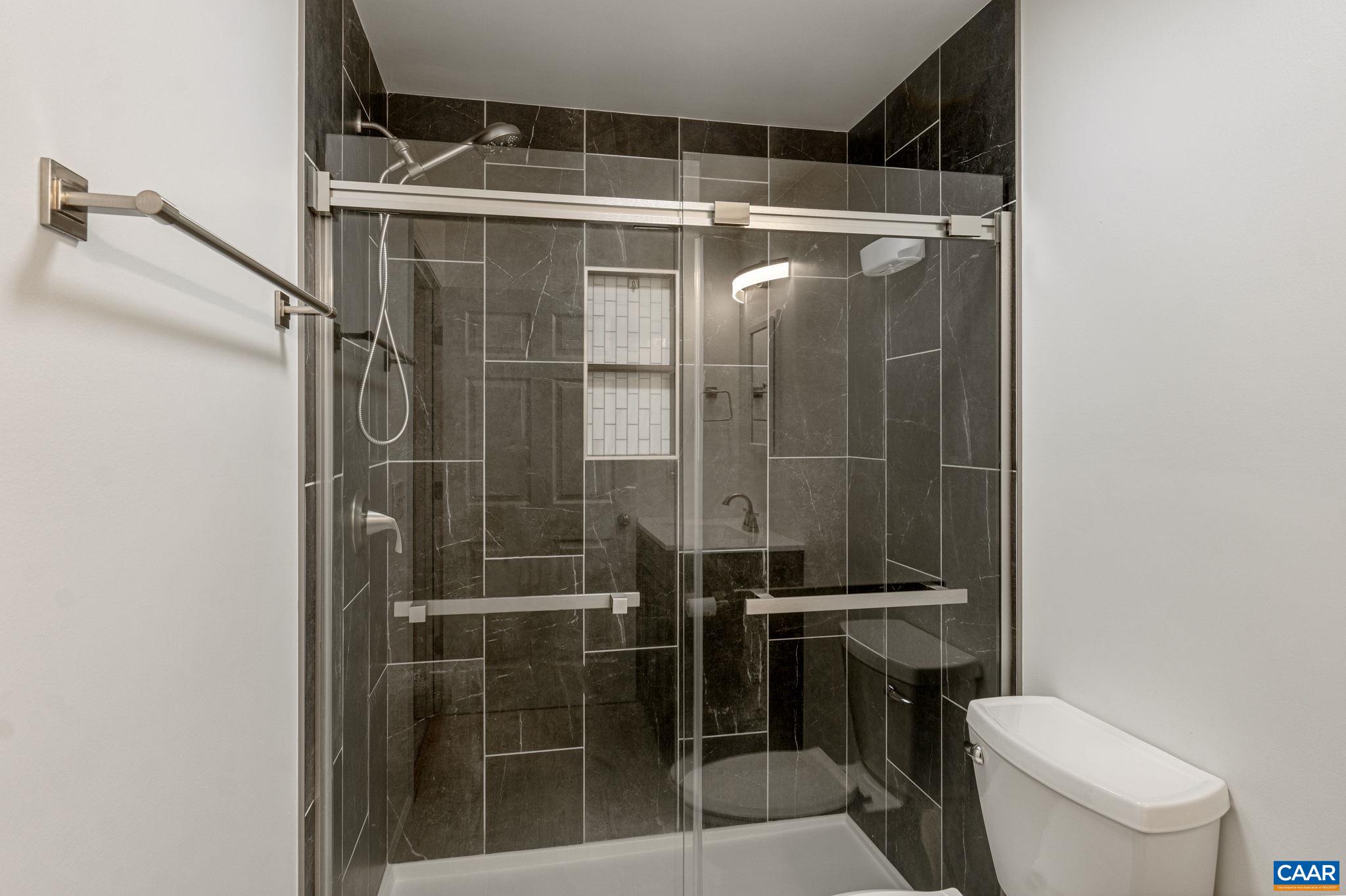 41 Colonial Road Palmyra, VA 22963 - Photo 49 of 53 a bathroom with a toilet and a shower