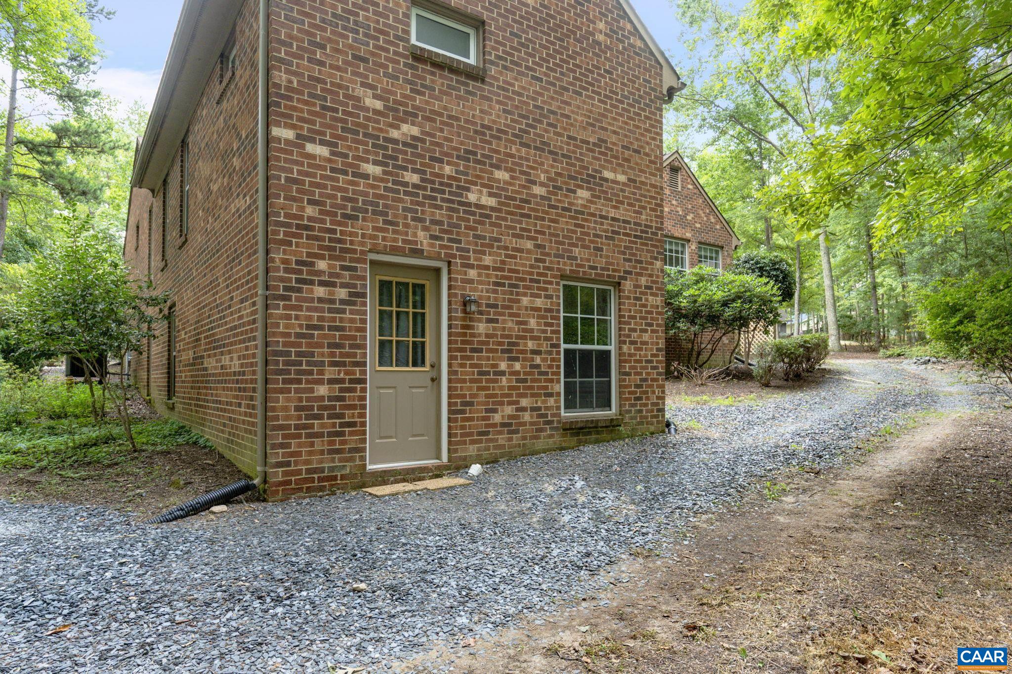 41 Colonial Road Palmyra, VA 22963 - Photo 6 of 53 a view of a house with backyard and garden