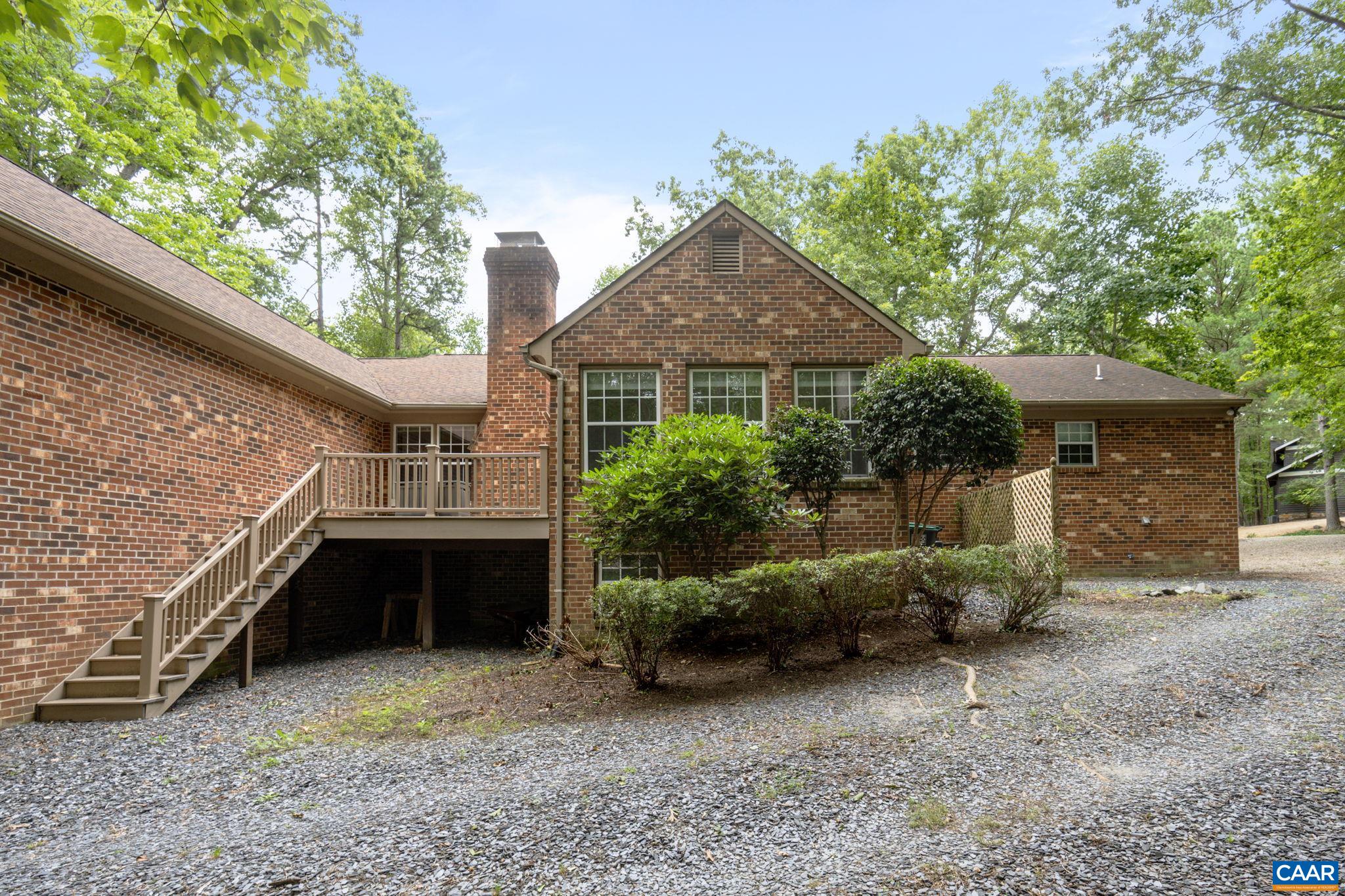 41 Colonial Road Palmyra, VA 22963 - Photo 7 of 53 a front view of a house with a garden