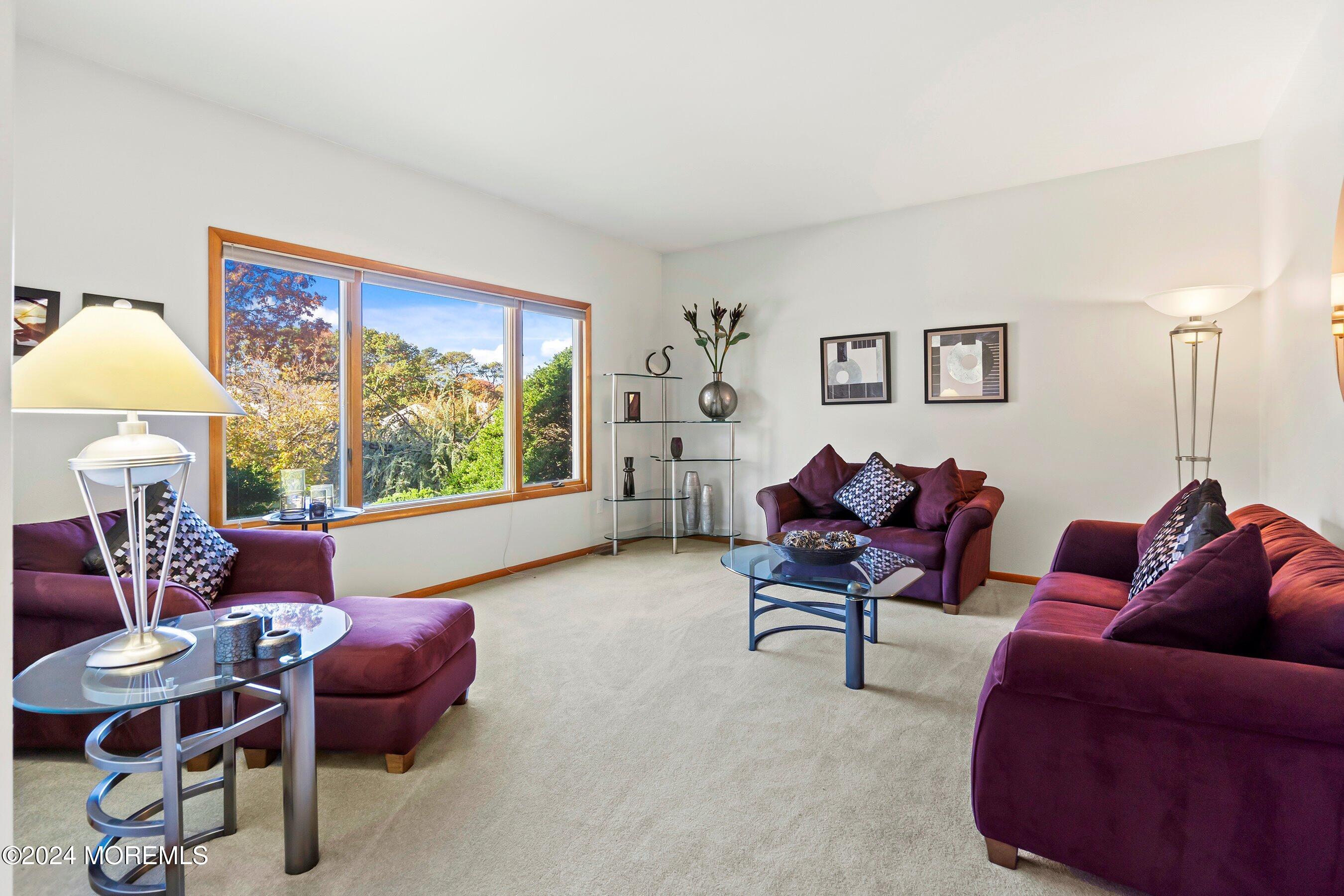 742 Rabbit Run Brick, NJ 08724 - Photo 11 of 51 a living room with furniture and a large window
