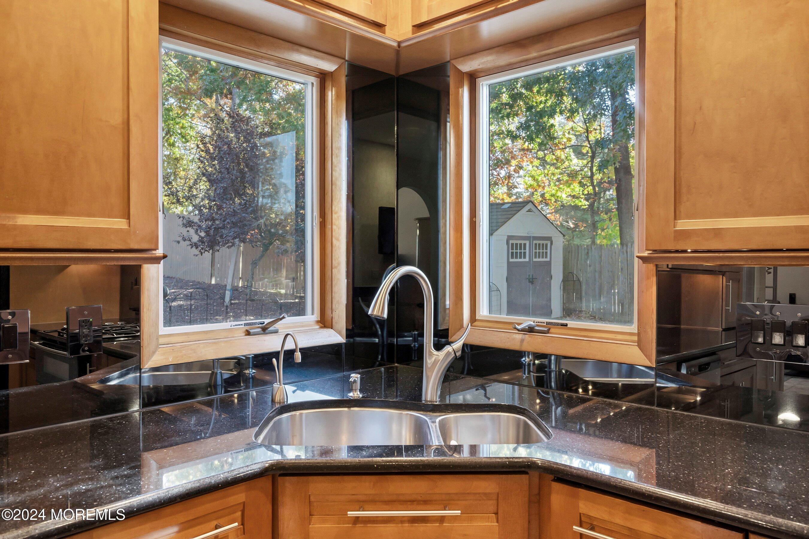 742 Rabbit Run Brick, NJ 08724 - Photo 20 of 51 a kitchen with a sink and a large window