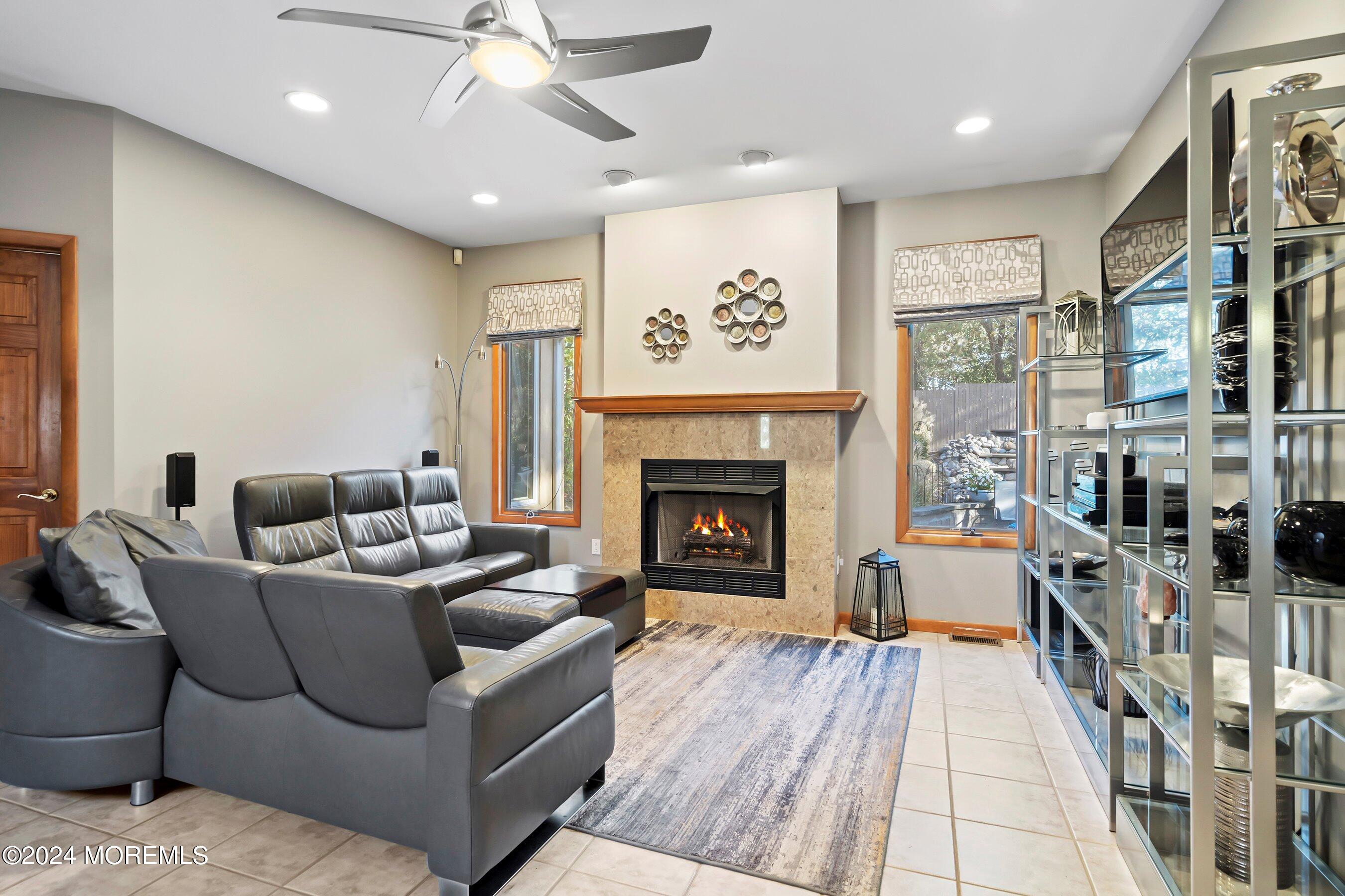 742 Rabbit Run Brick, NJ 08724 - Photo 25 of 51 a living room with furniture and a fireplace