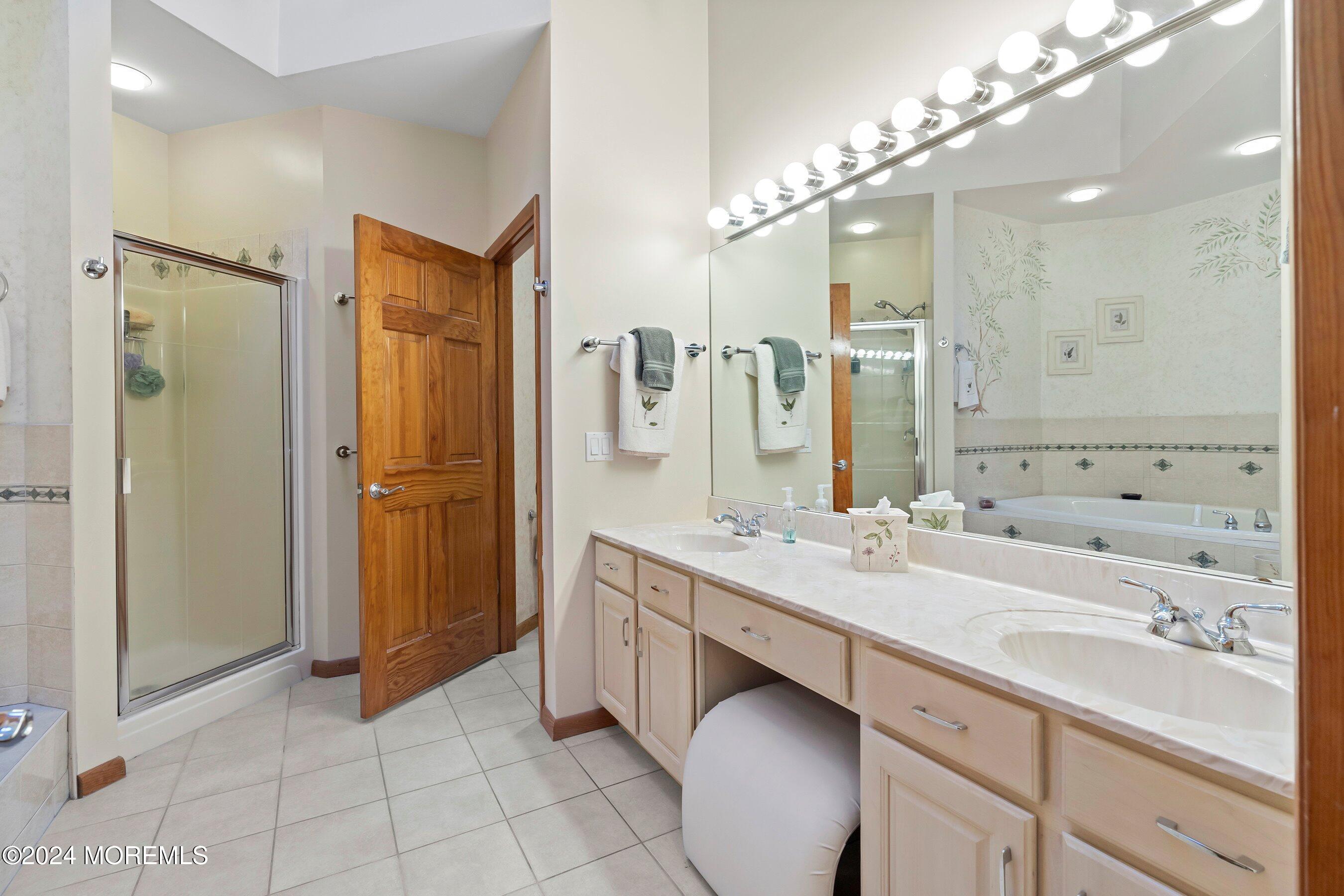 742 Rabbit Run Brick, NJ 08724 - Photo 29 of 51 a bathroom with a sink double vanity and a mirror