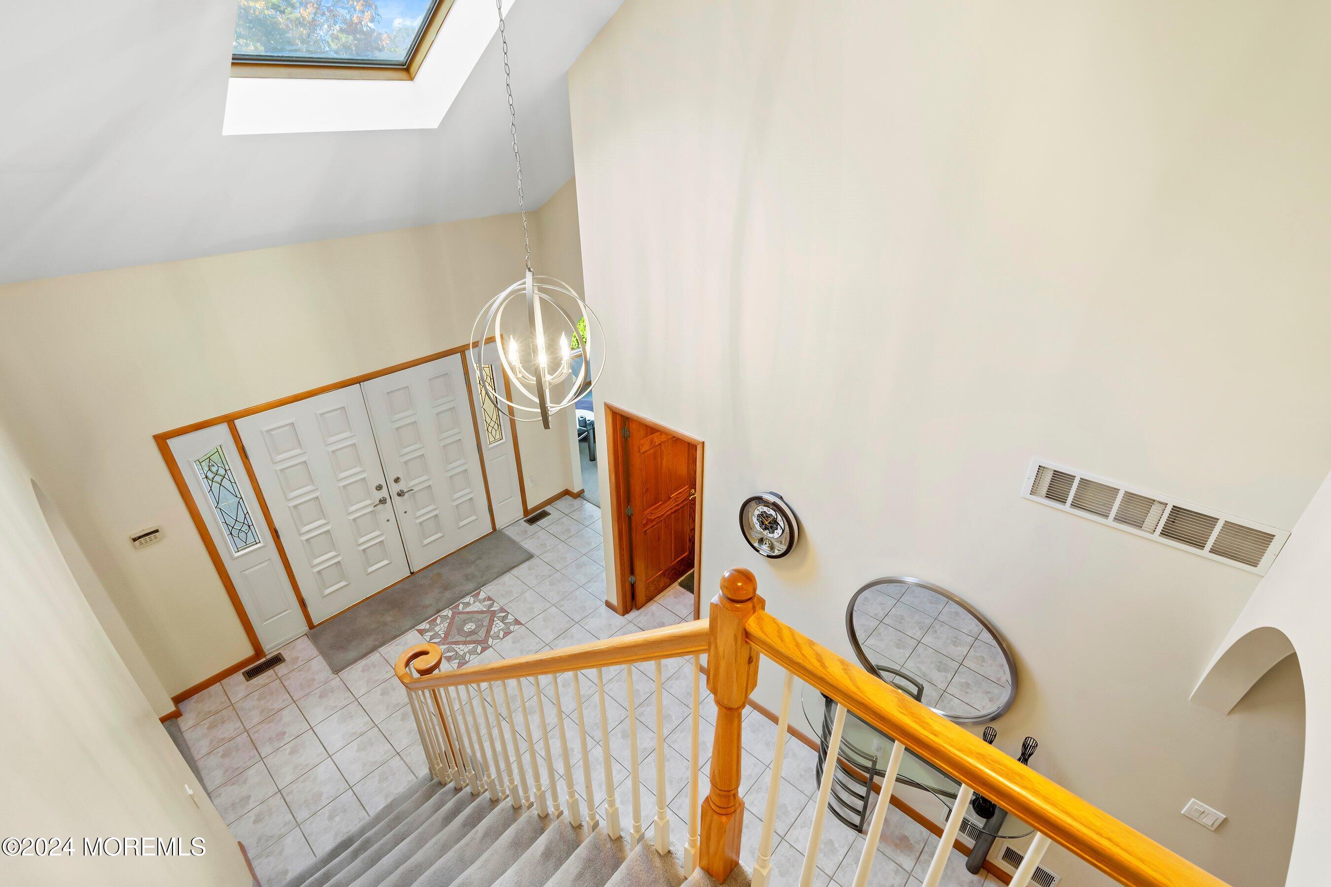 742 Rabbit Run Brick, NJ 08724 - Photo 34 of 51 a view of a balcony with wooden floor