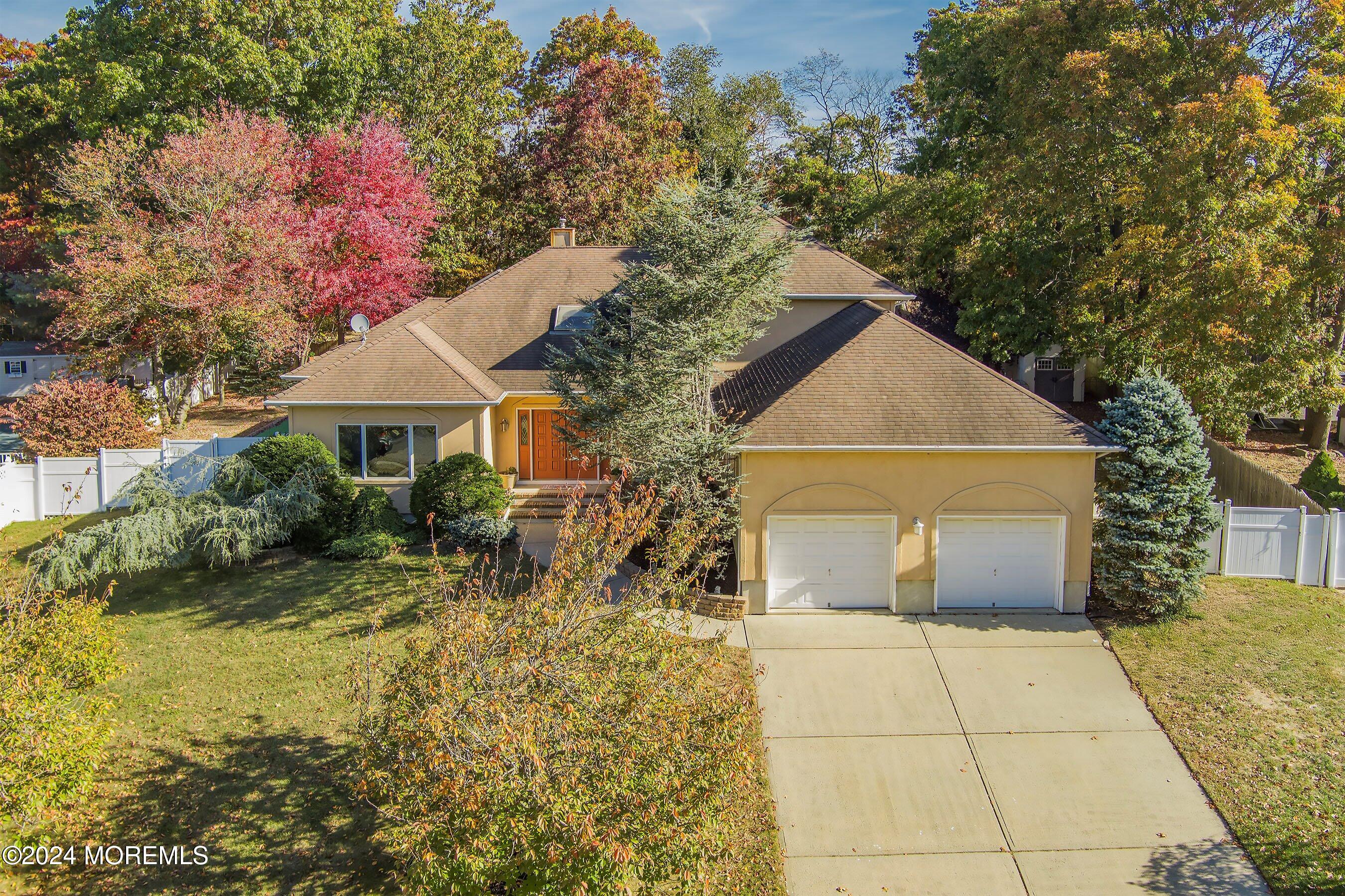 742 Rabbit Run Brick, NJ 08724 - Photo 4 of 51 a front view of a house with garden