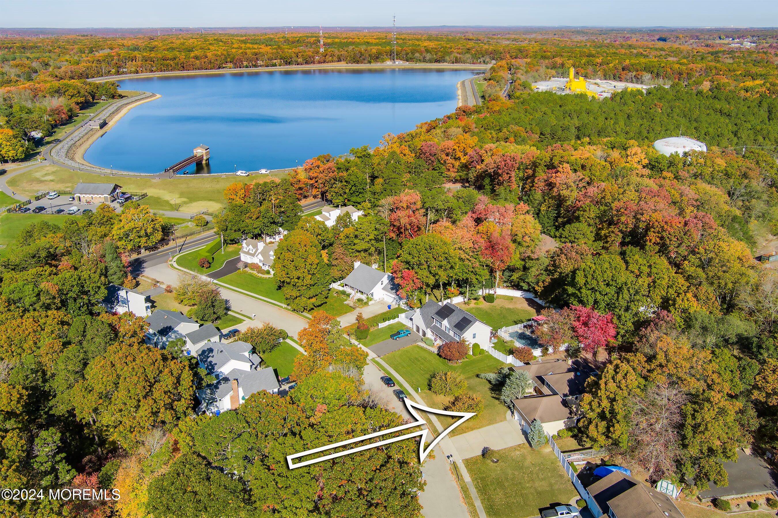742 Rabbit Run Brick, NJ 08724 - Photo 51 of 51 an aerial view of residential houses with outdoor space and lake view
