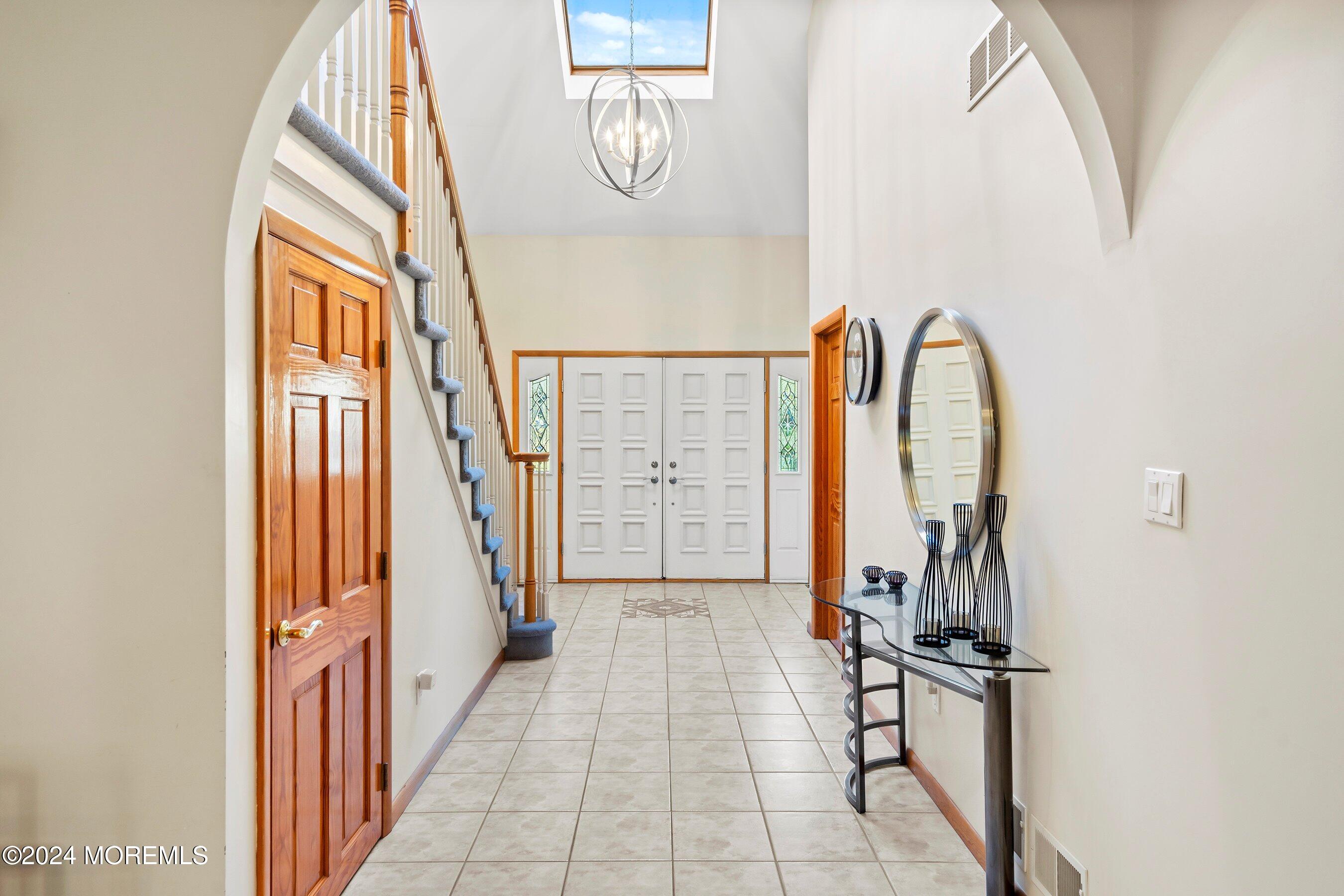 742 Rabbit Run Brick, NJ 08724 - Photo 10 of 51 a view of an entryway with wooden floor