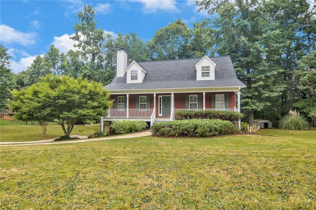 70 Vinny's Terrace Covington, GA 30014 - Photo 1 of 1 a front view of a house with a yard