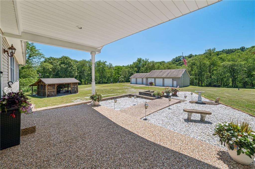 452 Upper Service Road Hookstown, PA 15050 - Photo 3 of 41 a house view with a sitting space and garden view