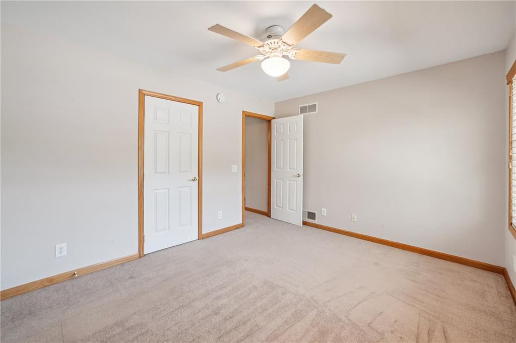 452 Upper Service Road Hookstown, PA 15050 - Photo 32 of 41 an empty room with fan and a ceiling fan