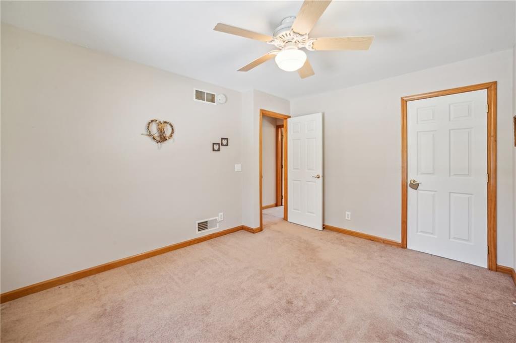 452 Upper Service Road Hookstown, PA 15050 - Photo 34 of 41 an empty room with closet and a ceiling fan