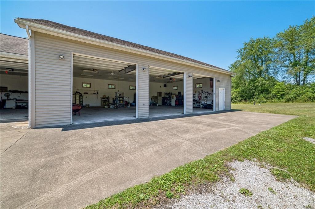 452 Upper Service Road Hookstown, PA 15050 - Photo 10 of 41 a view of a house with a patio