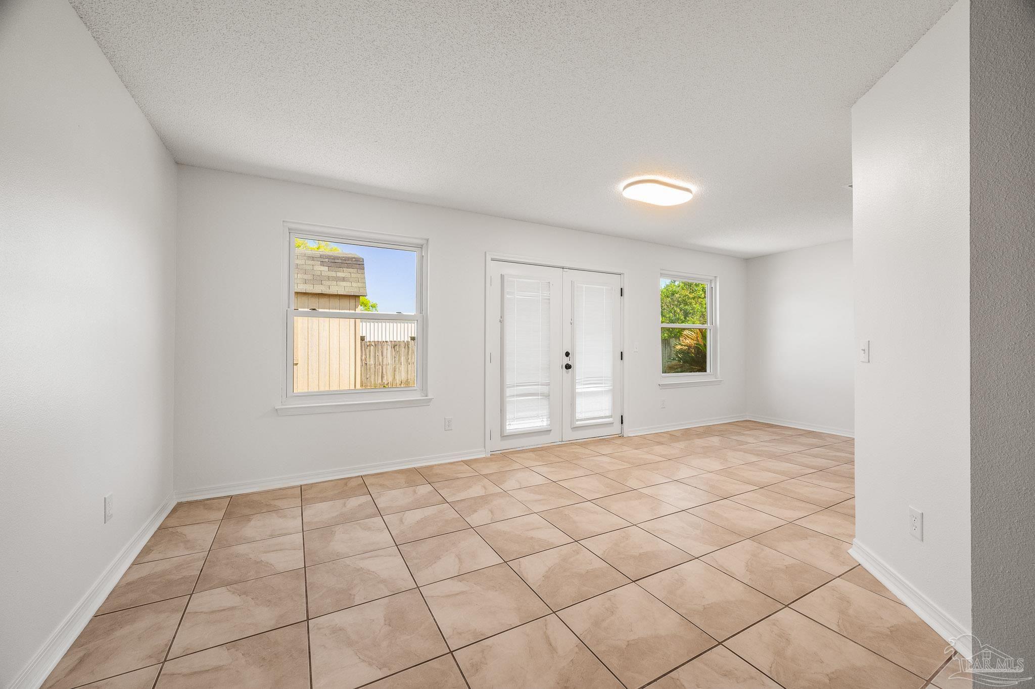 4263 Crosswind Drive Milton, FL 32583 - Photo 15 of 43 a view of an empty room and window