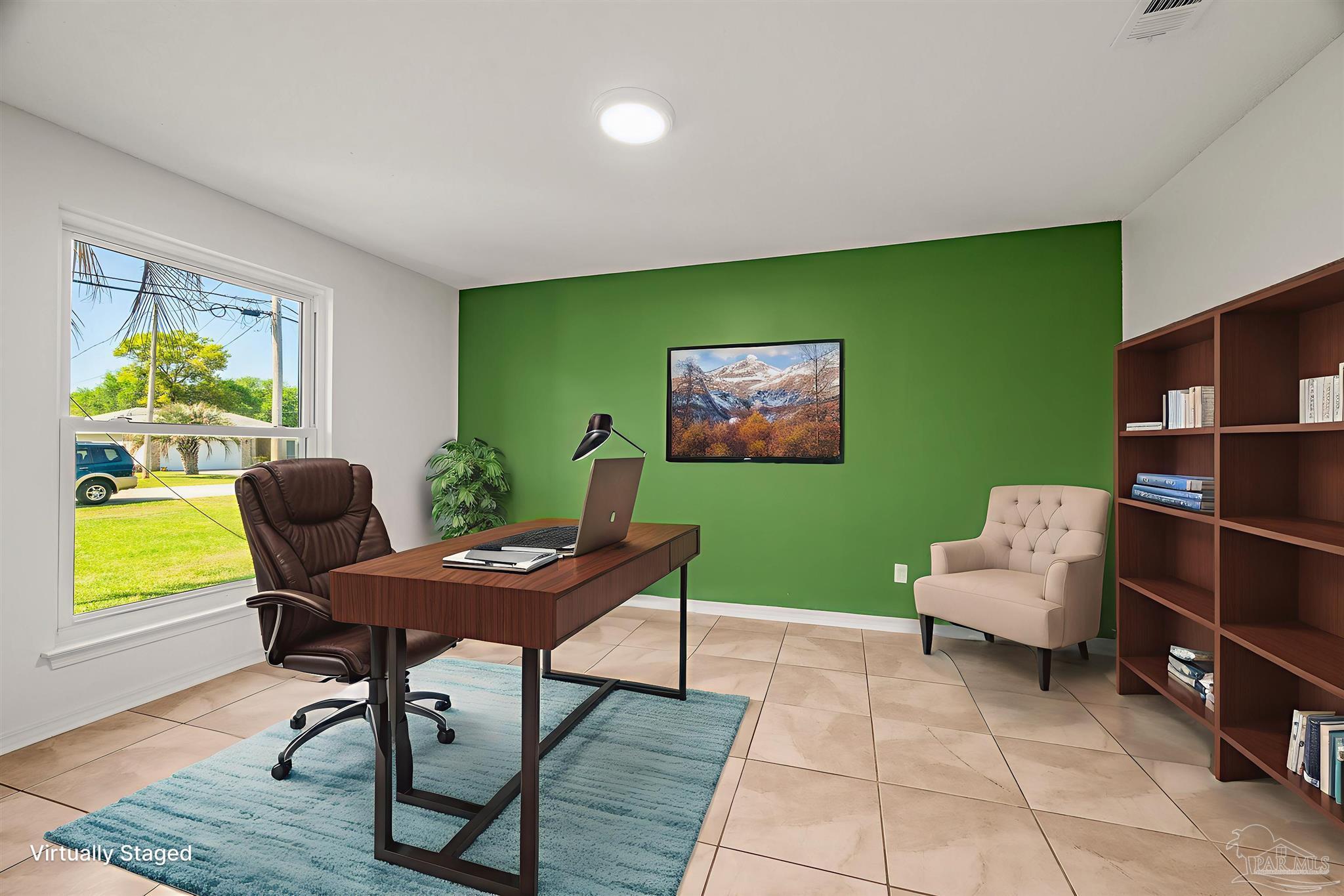 4263 Crosswind Drive Milton, FL 32583 - Photo 4 of 43 a living room with furniture and a potted plant