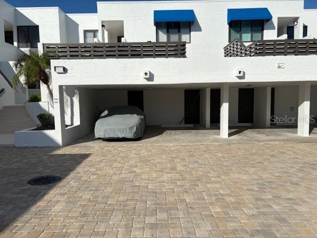 737 Bayport Way, Unit D Longboat Key, FL 34228 - Photo 12 of 31 a living room with furniture