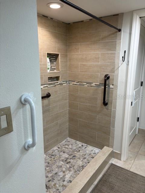 737 Bayport Way, Unit D Longboat Key, FL 34228 - Photo 16 of 31 a bathroom with a shower