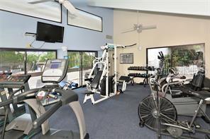737 Bayport Way, Unit D Longboat Key, FL 34228 - Photo 29 of 31 a view of a room with gym equipment