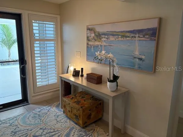 a room with a table and a window