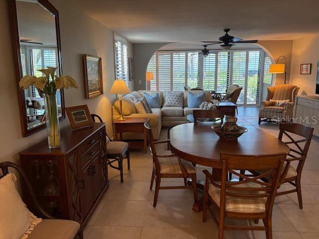 737 Bayport Way, Unit D Longboat Key, FL 34228 - Photo 10 of 31 a view of a dining room with furniture