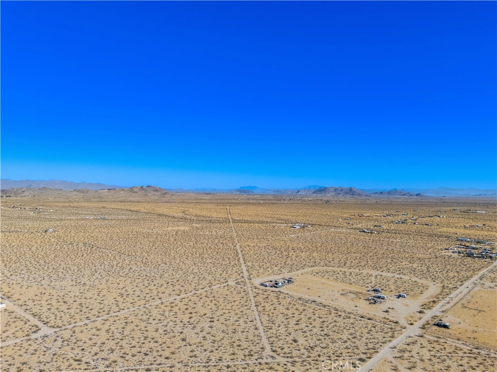 6311431 Sunset Road Joshua Tree, CA 92252 - Photo 6 of 15 a view of an ocean beach
