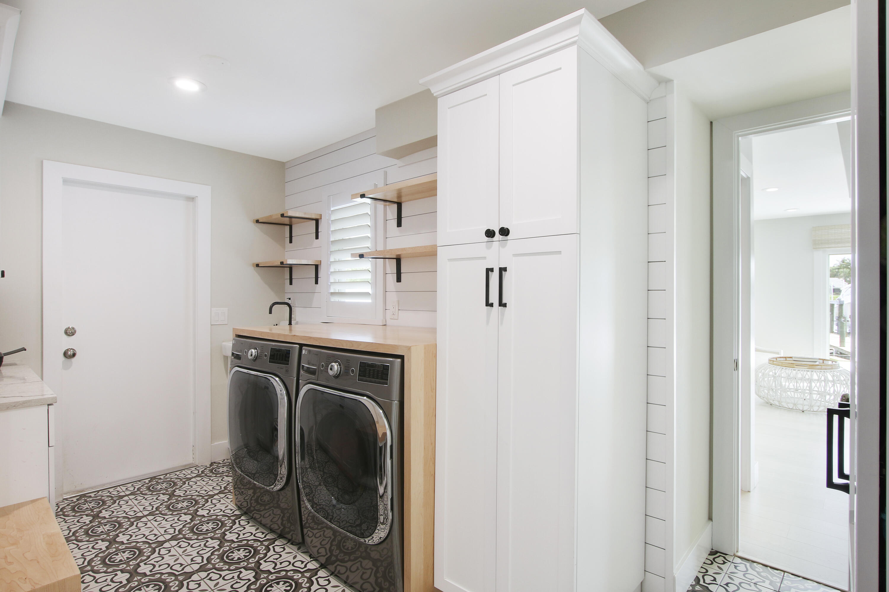 19 Saddleback Road Tequesta, FL 33469 - Photo 34 of 69 Laundry w sink