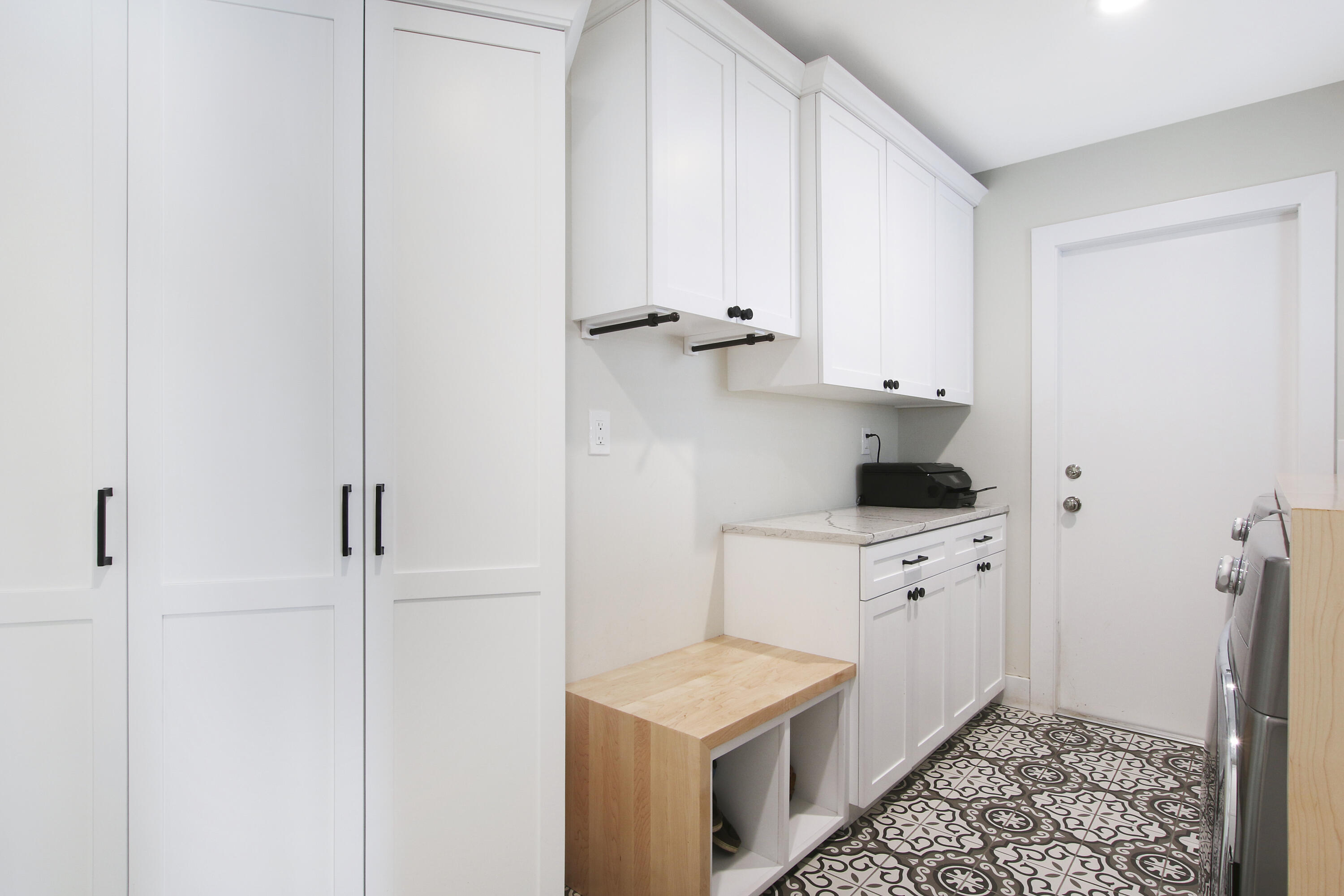 19 Saddleback Road Tequesta, FL 33469 - Photo 36 of 69 laundry to storage room off garage