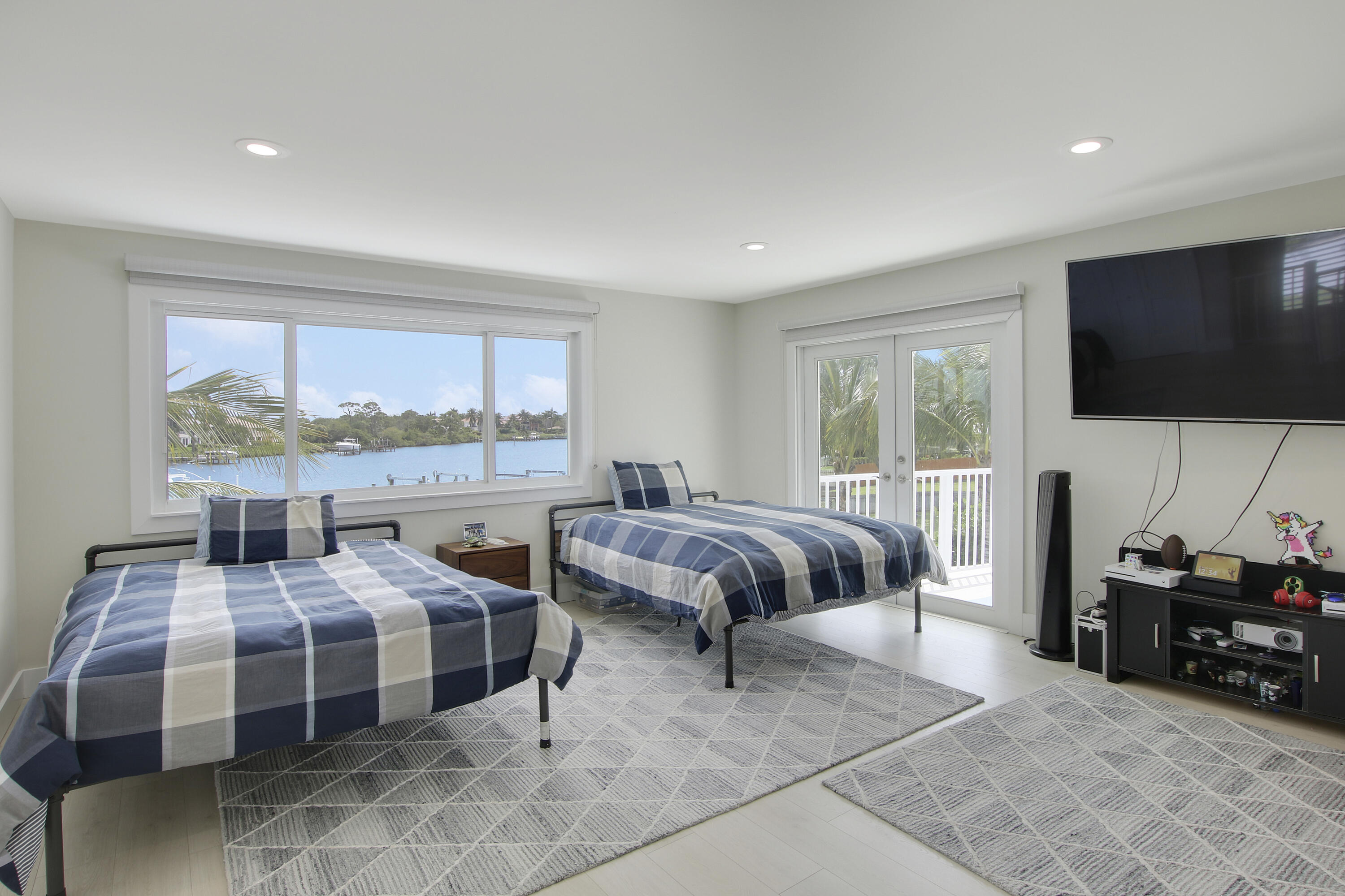 19 Saddleback Road Tequesta, FL 33469 - Photo 43 of 69 Large 3rd Bedroom to Outder Deck