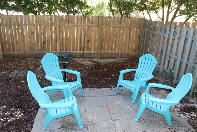 a view of a chairs in patio