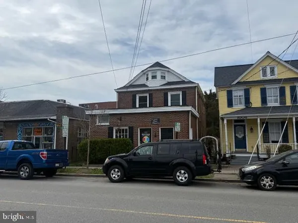 a car parked in front of a house