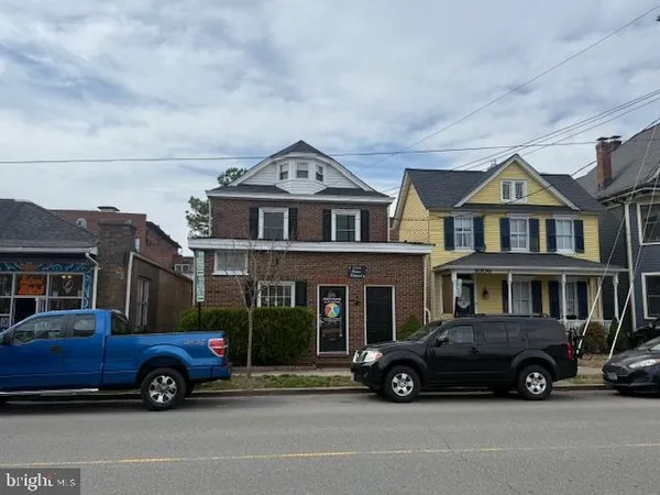 a car parked in front of a house