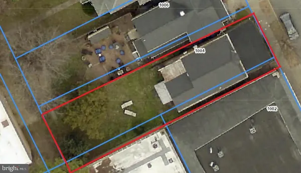 a close up of a room with bed