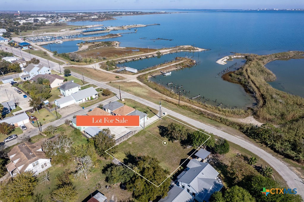 Tbd Commerce Street Port Lavaca, TX 77979 - Photo 7 of 12 an aerial view of residential houses with outdoor space